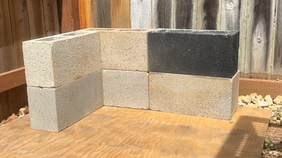 2. Arrange cinder blocks into a rectangular or square shape.