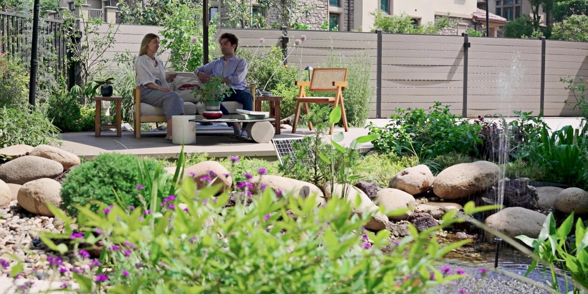 Backyard pond planning example with natural stones and planted pond edge